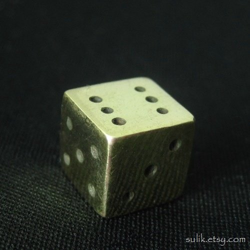 Brass dice