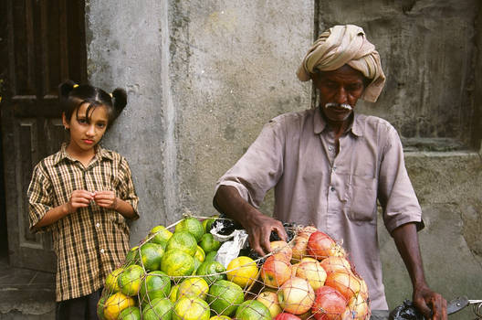 the girl and the fruit vendor