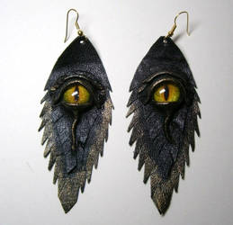 Dragon eye black antiqued leather earrings.