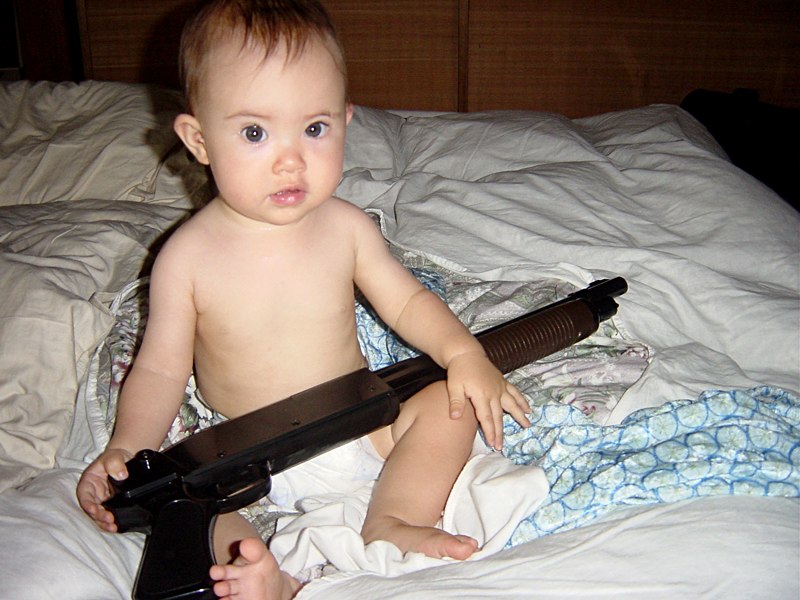 baby with a shotgun