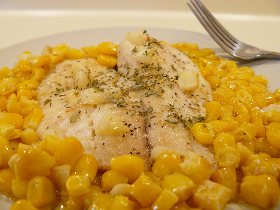 Tilapia on bed of corn