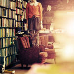 Standing in a bookshop by Holunder