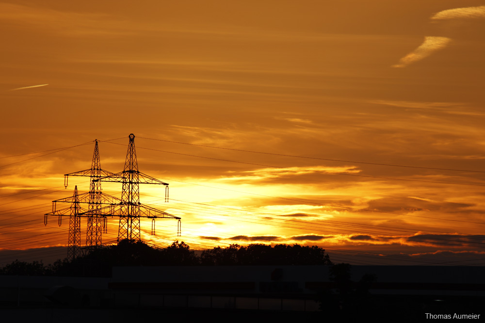 Sunset with power poles