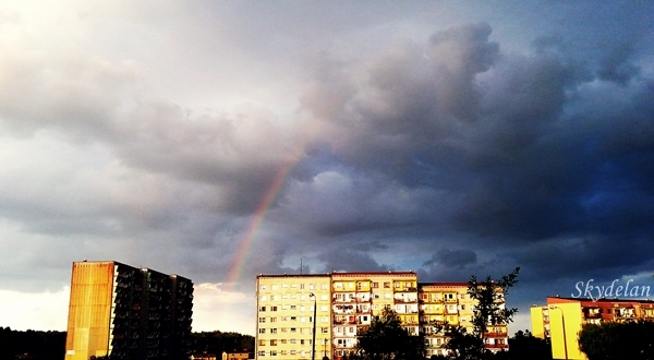 Rainbow over the blocks.