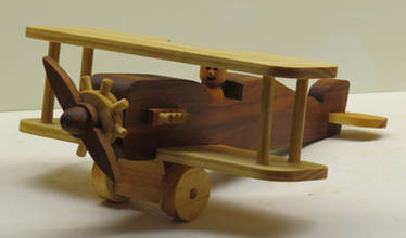 Wooden toy biplane