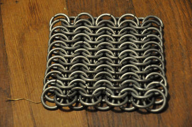 Chainmail coaster catch toy