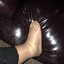 Fat Swollen Foot On Leather Couch