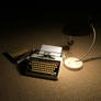 A glass of red wine, a good book and a typewriter!