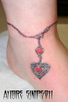 Heart pendant anklet tattoo