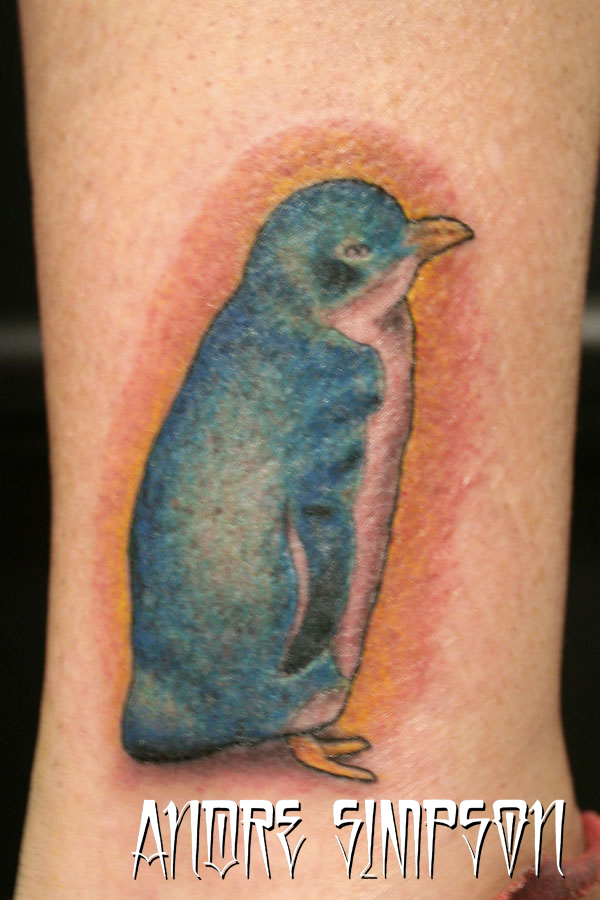 Blue penguin tattoo