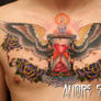 Hourglass chest tattoo