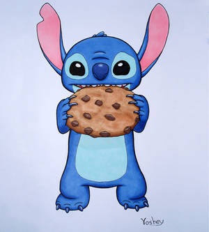 Stitch enjoying a large cookie