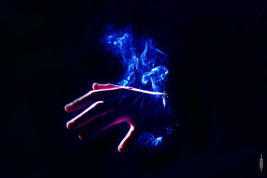 hands in smoke