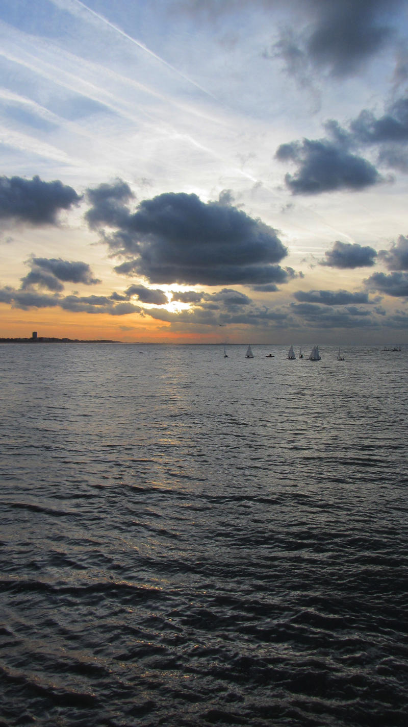 Nieuwpoort 11. Sunset with sailboats.