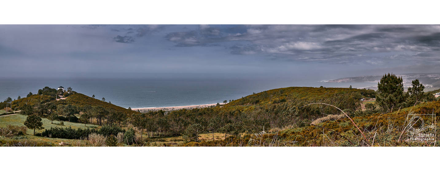 land-seascape pano with gentrified windmill