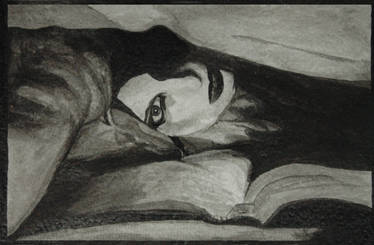 under the  blanket with book