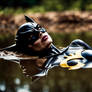 Batgirl washes up on the shore. Alive?