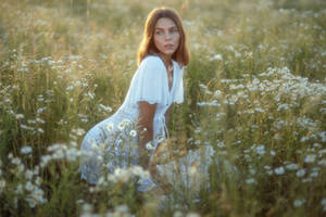 Girl and daisies