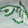 Beaded white and green fish