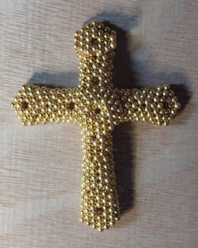 Magnetic gold cross