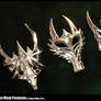 3 Dragon mask pendants