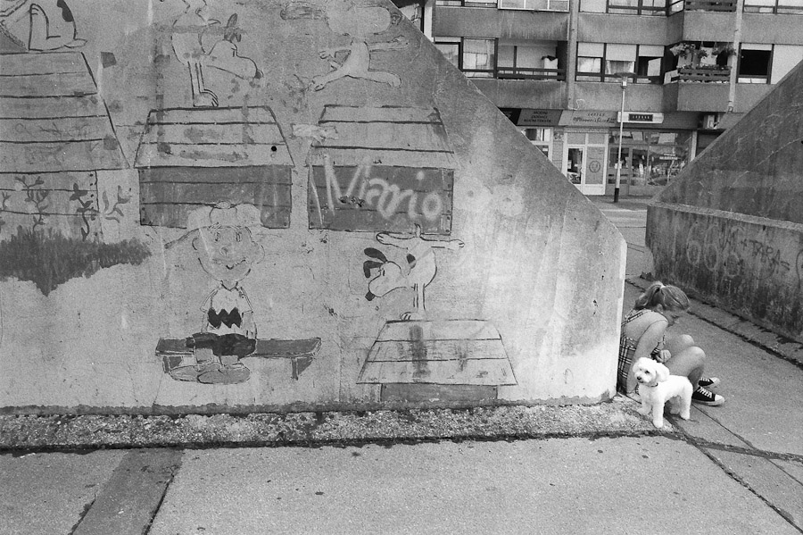 little girl with a dog and Snoopy...