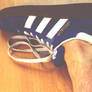 Naked boyfeet in Adidas Spezial sneakers.