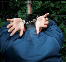 His big hands helpless in handcuffs. by SneakerBoyBondage