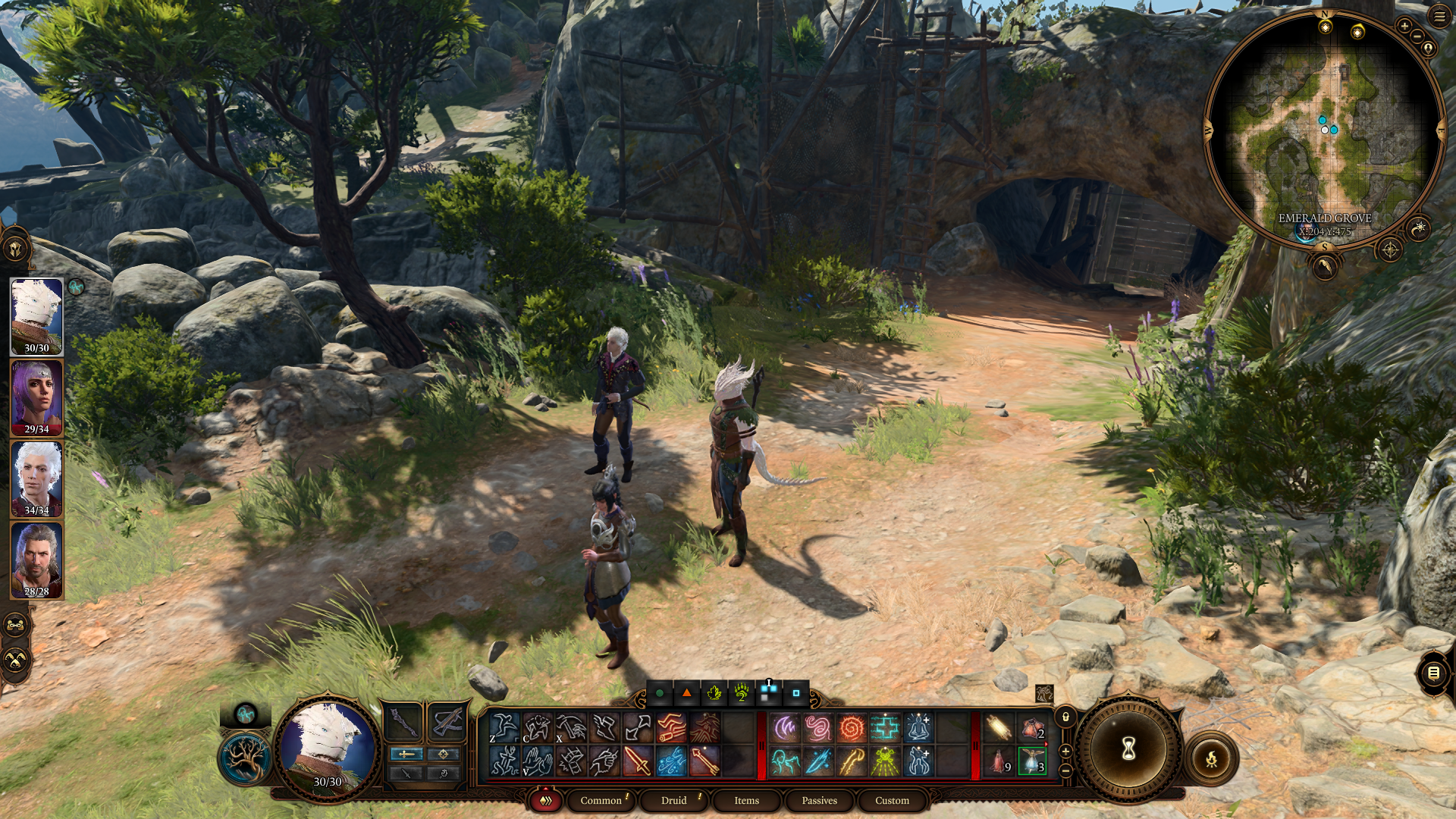 A screenshot from Baldur's Gate of the player and their party on a forest trail. The focus of the image is on the user interface, which is set up for keyboard and mouse, and has smaller text and icons in a rectangular box along the bottom of the screen for spells and actions.