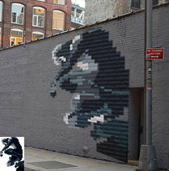 Pixelated Venom on Street Wall
