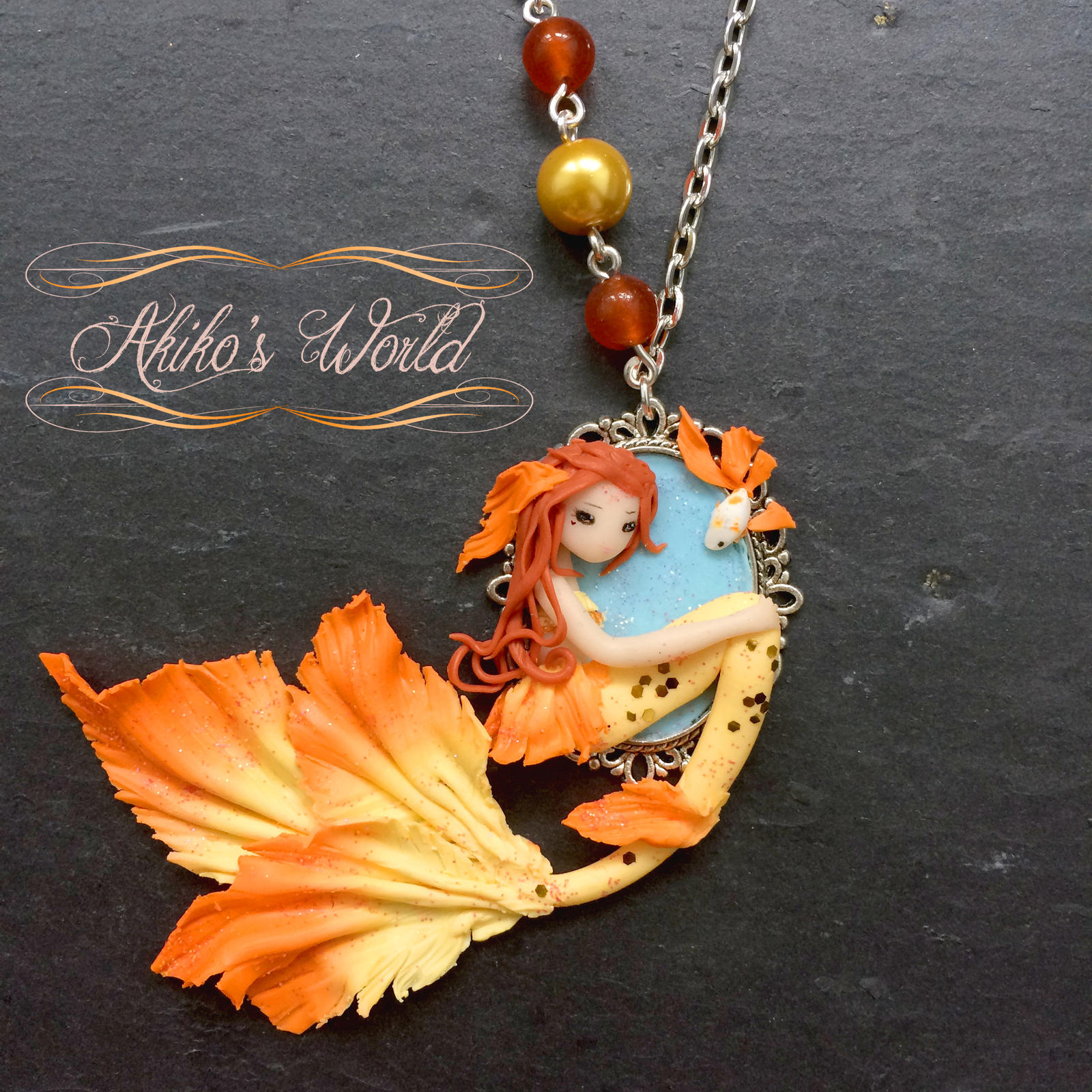 Gold and orange chibi mermaid cameo