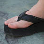 Natural Toes in Black Flip Flop