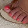 Pink Toes Close Up On Cement