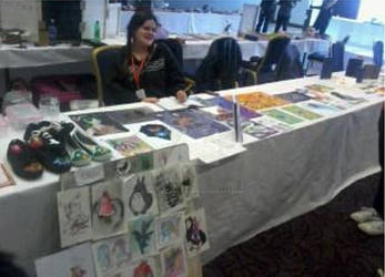 Akacon Artist Alley table (Anthea West) by Emily-Draws-Things