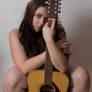 Nude with guitar and FACE