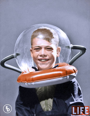 Rocket ship prize, boy wearing a space helmet.