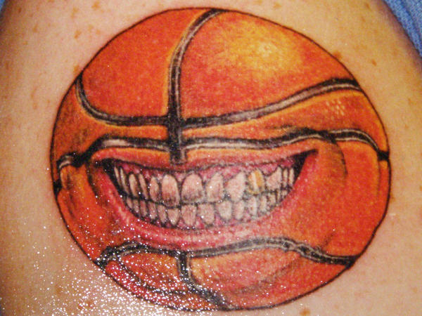 grinning basketball tat