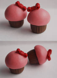 Miniature Pink Cupcakes with Red Bows