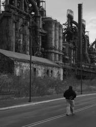 Man Walking Toward Mill