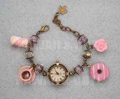 Bracelet Clock with pink sweets and candys