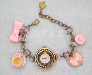 Bracelet Clock with pink sweets and candys