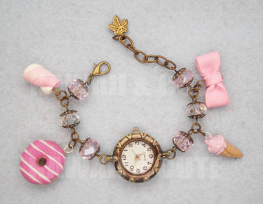 Bracelet Clock with pink sweets and candys