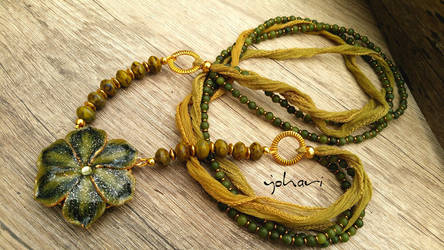A necklace from the green moss collection