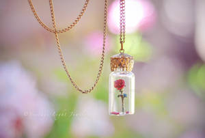 Beauty and the Beast Rose in Bottle Necklace by VintageLightJewelry