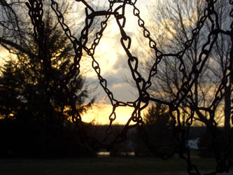 Sunset through chains