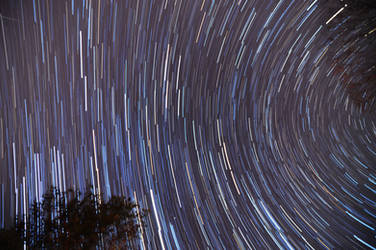 2012 Geminid Star Trail 2 by blackismyheart90