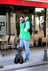 guy in green with cute dog