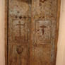 Double door with crucifixes