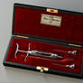 antique hypodermic syringe set