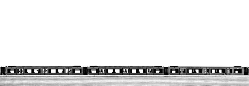 Subwaytrain into the sunrise (black and white)